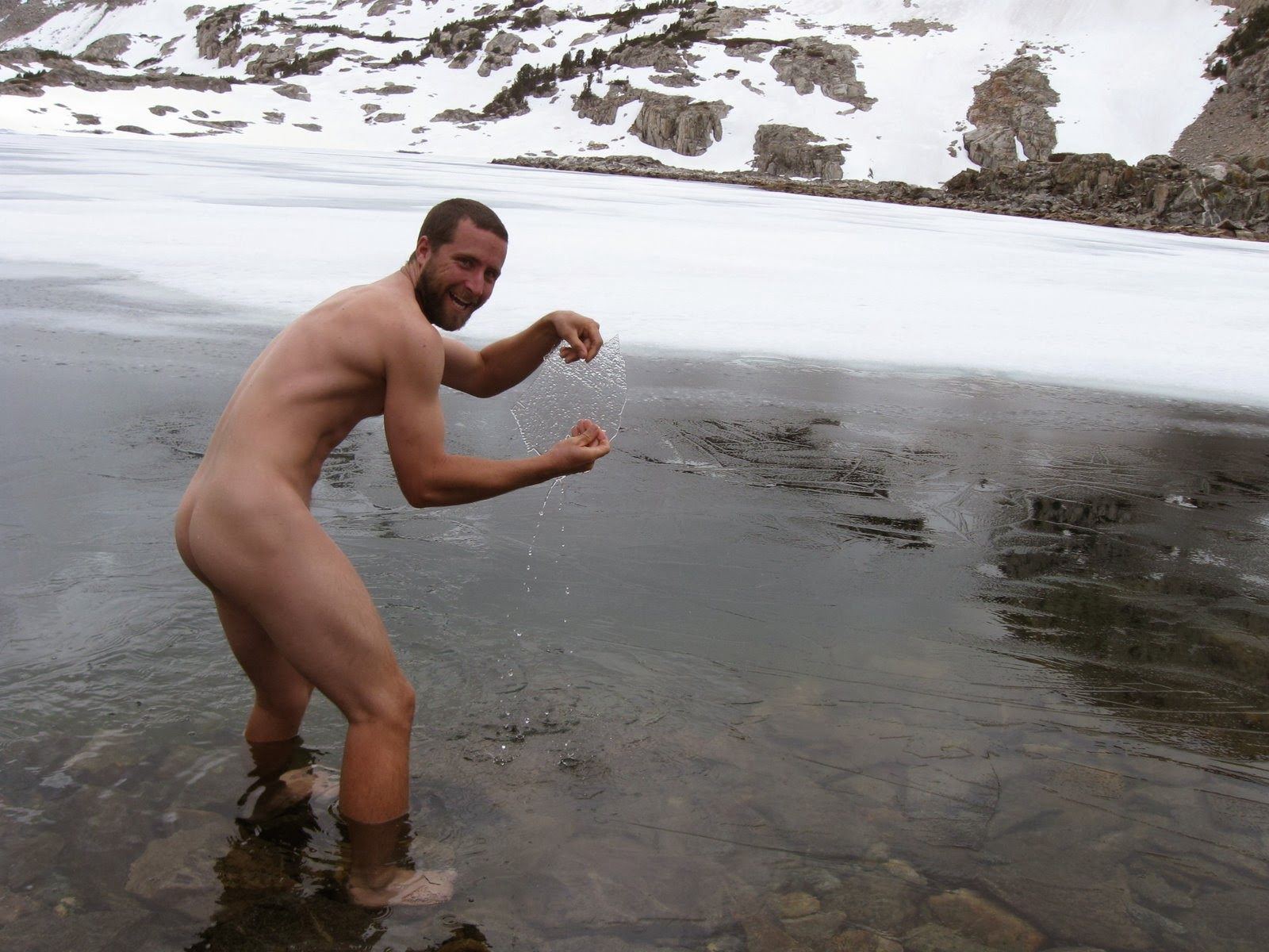 Sexy guy naked in the snow