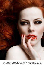 Erotic redhead vampiress