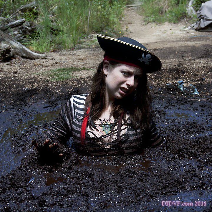 Sexy girls sinking in deep mud